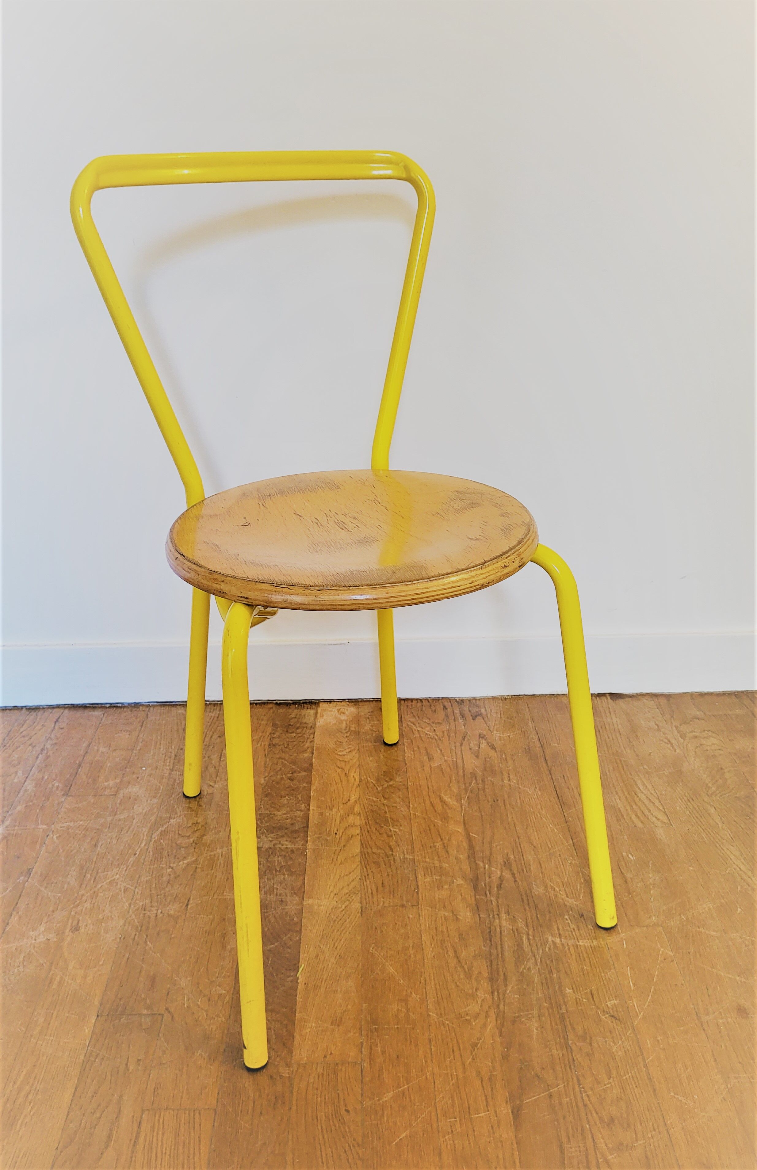 Vintage yellow school chairs from the 90s