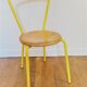 Vintage yellow school chairs from the 90s