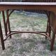 Old oak desk with curved wooden sleepers in the Art Nouveau spirit of the early 20th century.