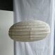 Large oval flat Japanese-style suspension in rattan and natural linen H35 D60.