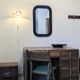 Miroir vintage noir aux angles arrondis