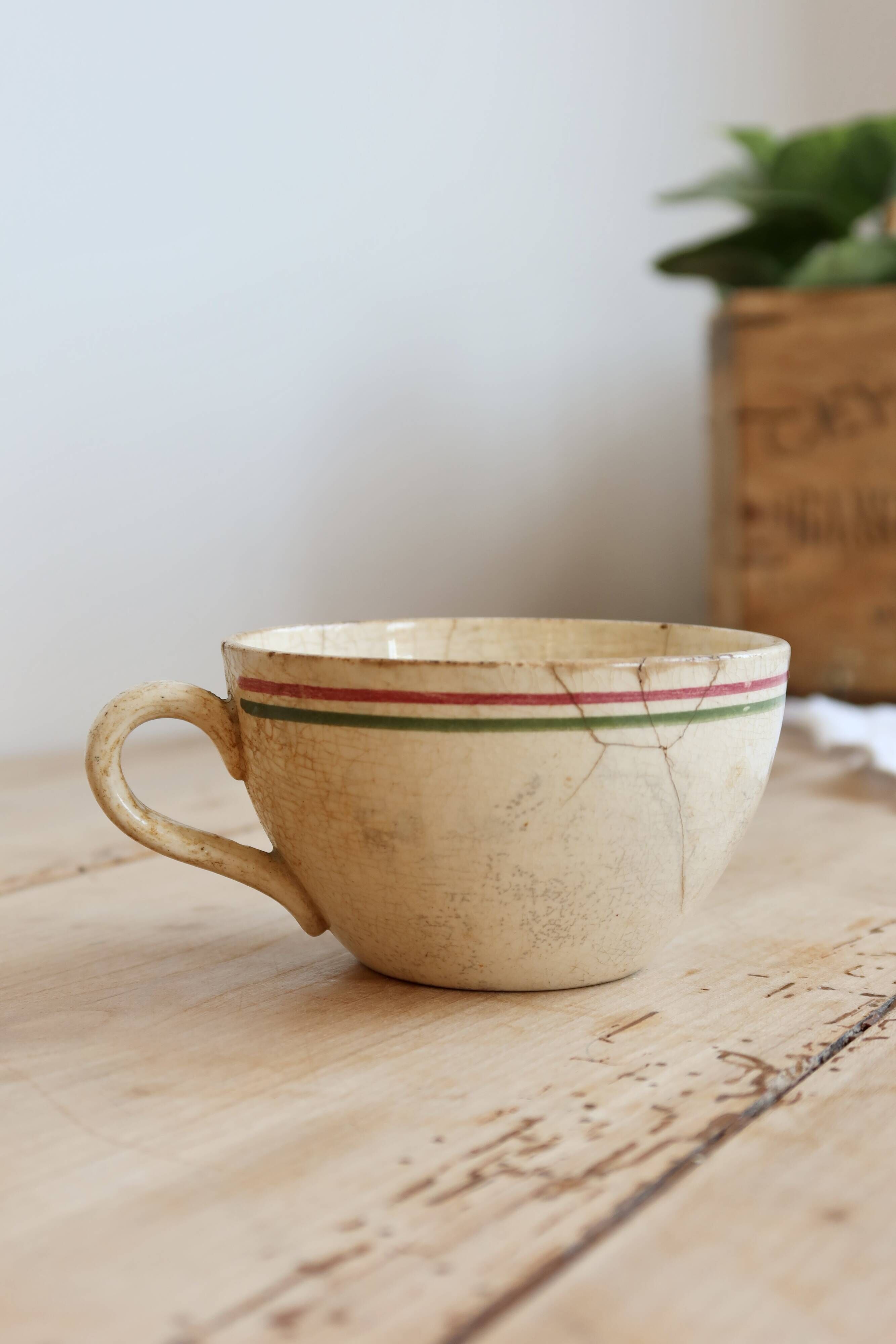 Antique ironstone coffee cup, patinated Sarreguemines – Floral decoration