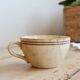 Antique ironstone coffee cup, patinated Sarreguemines – Floral decoration