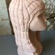 Bust of lady with hood in terracotta