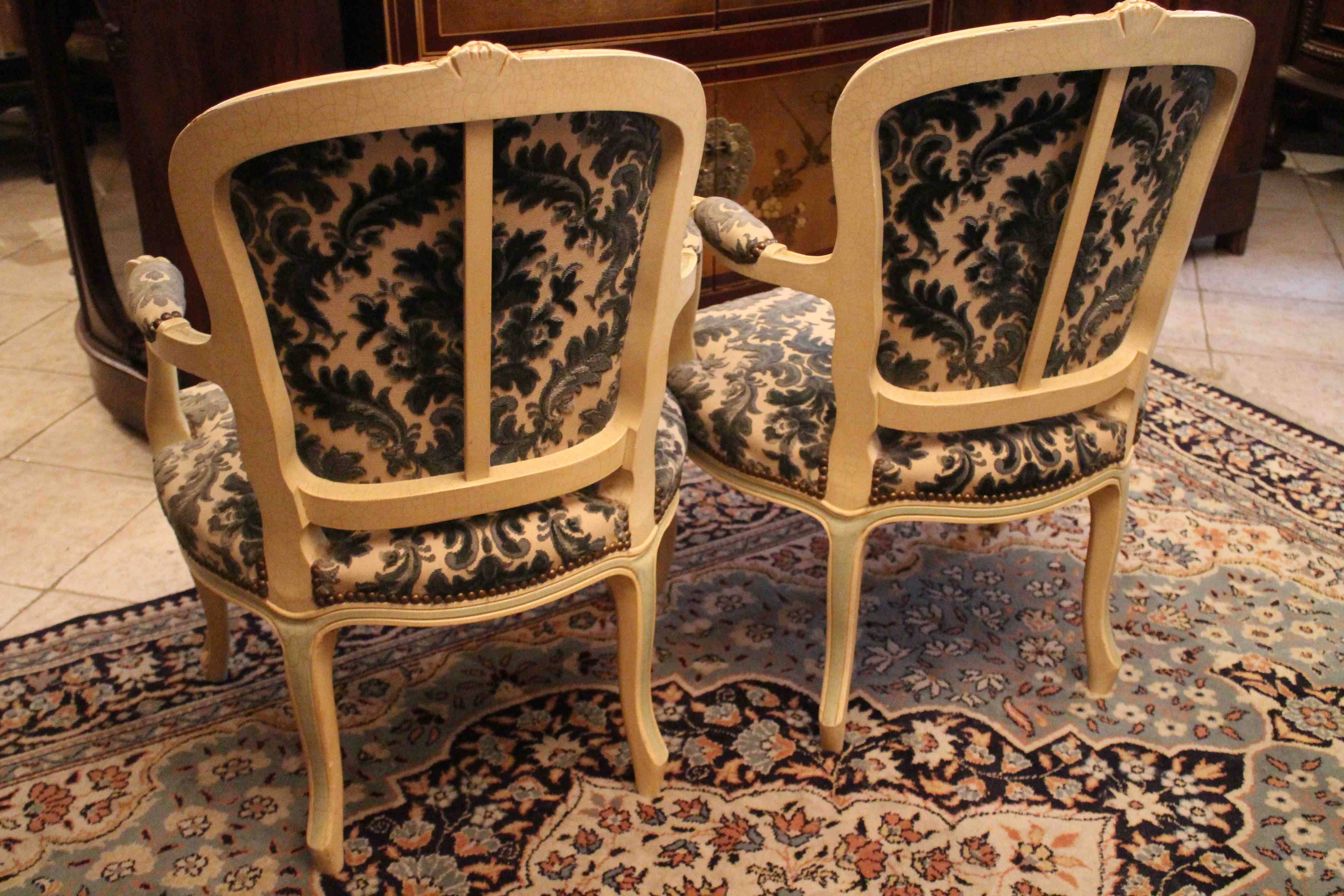 Pair of Louis XV-style convertible armchairs