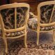 Pair of Louis XV-style convertible armchairs