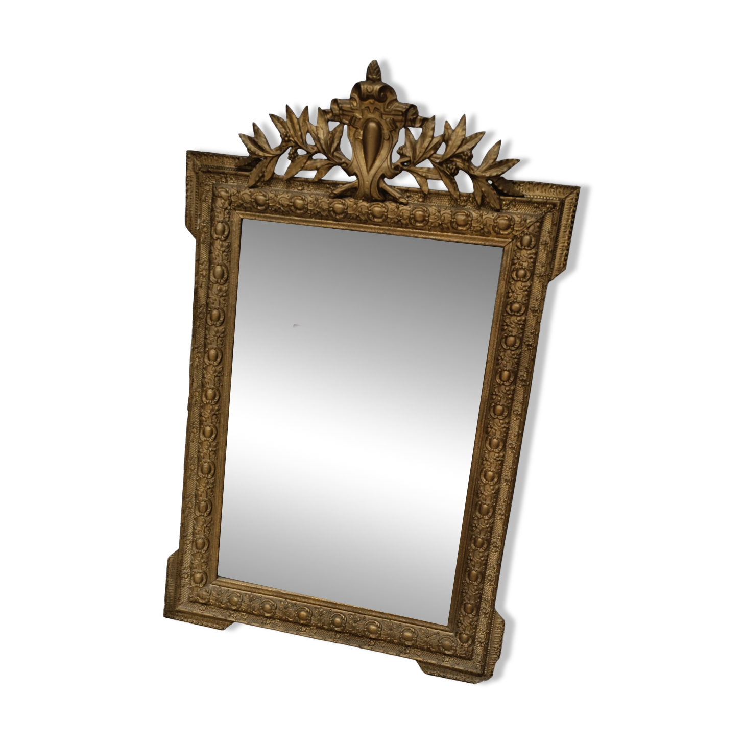 Antique mirror in Napoléon III style with a laurel pediment.