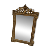 Antique mirror in Napoléon III style with a laurel pediment.
