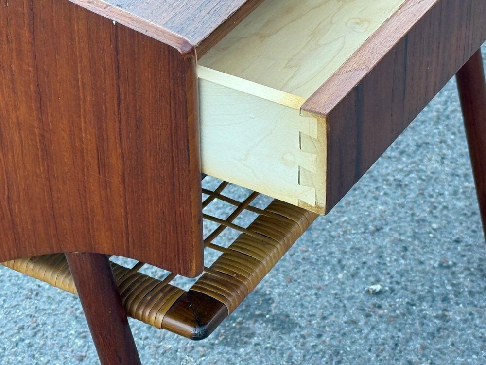 Modernist Danish teak bedside tables with rattan shelves, set of 2