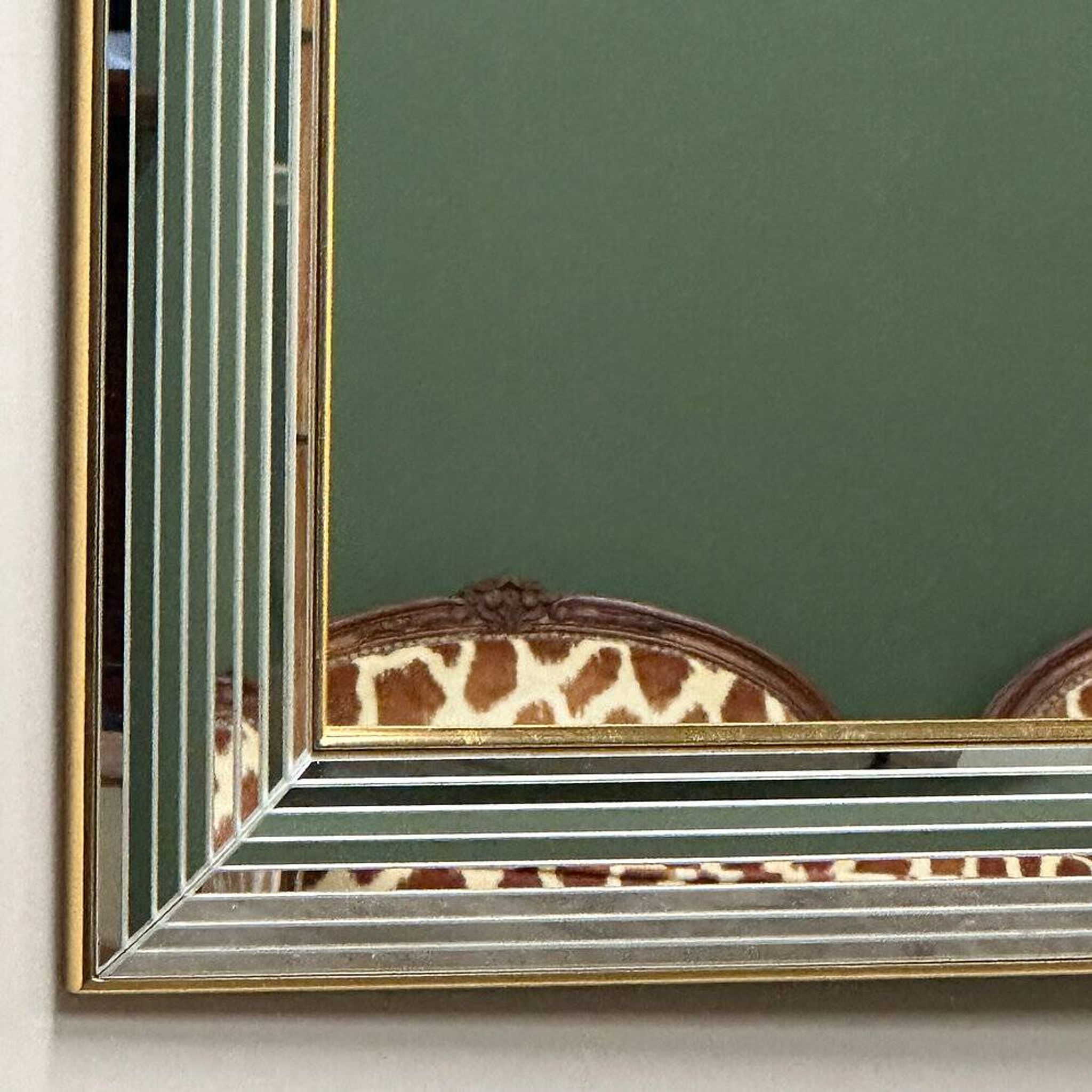 DeKnudt 1980s “Disco” mirror with layered bevelled frame & gilt trim