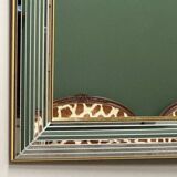 Miroir « Disco » DeKnudt des années 1980, avec cadre biseauté à plusieurs niveaux et bordure dorée.