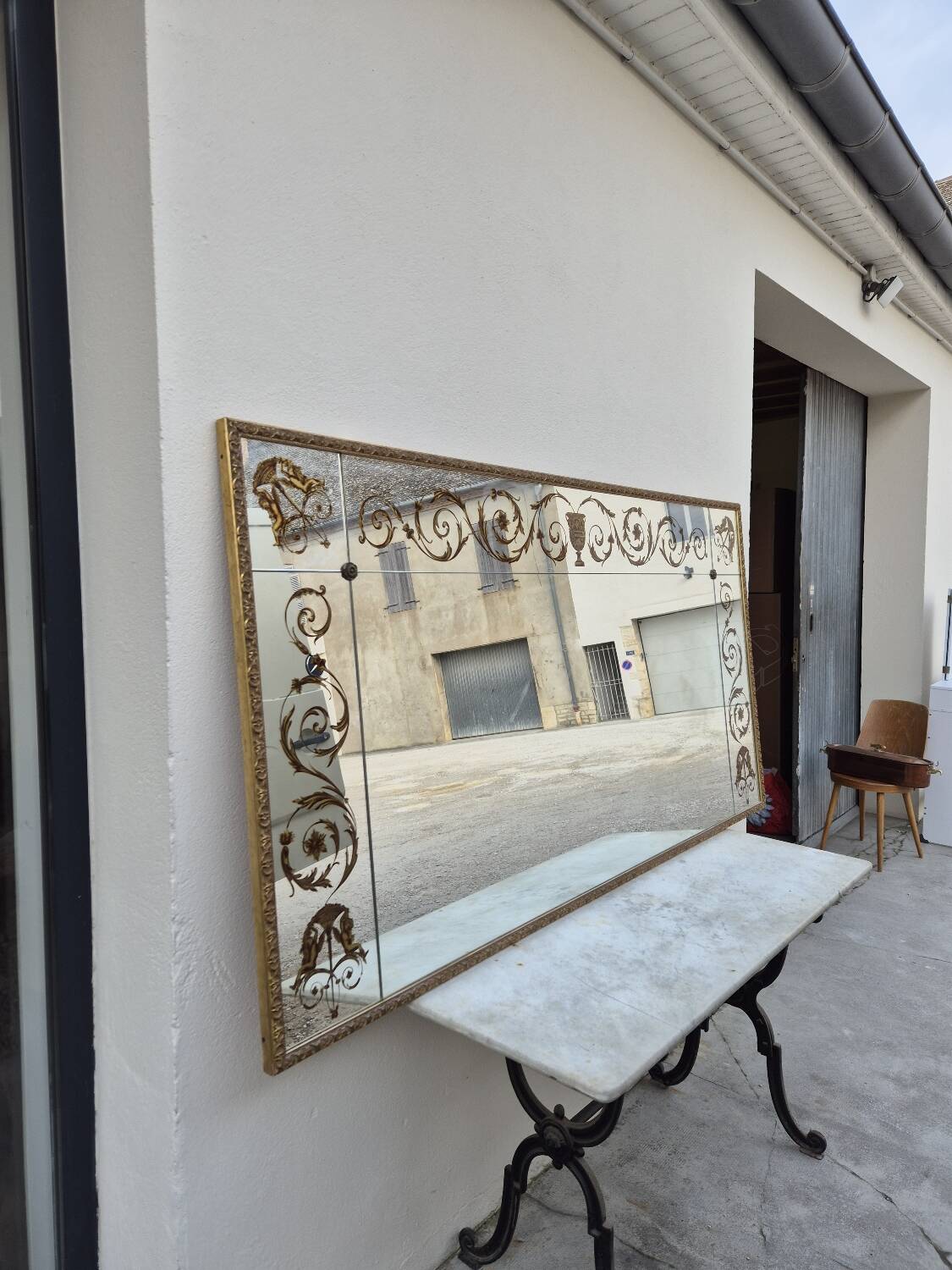 Antique gilded Venetian brasserie mirror in eglomised glass
