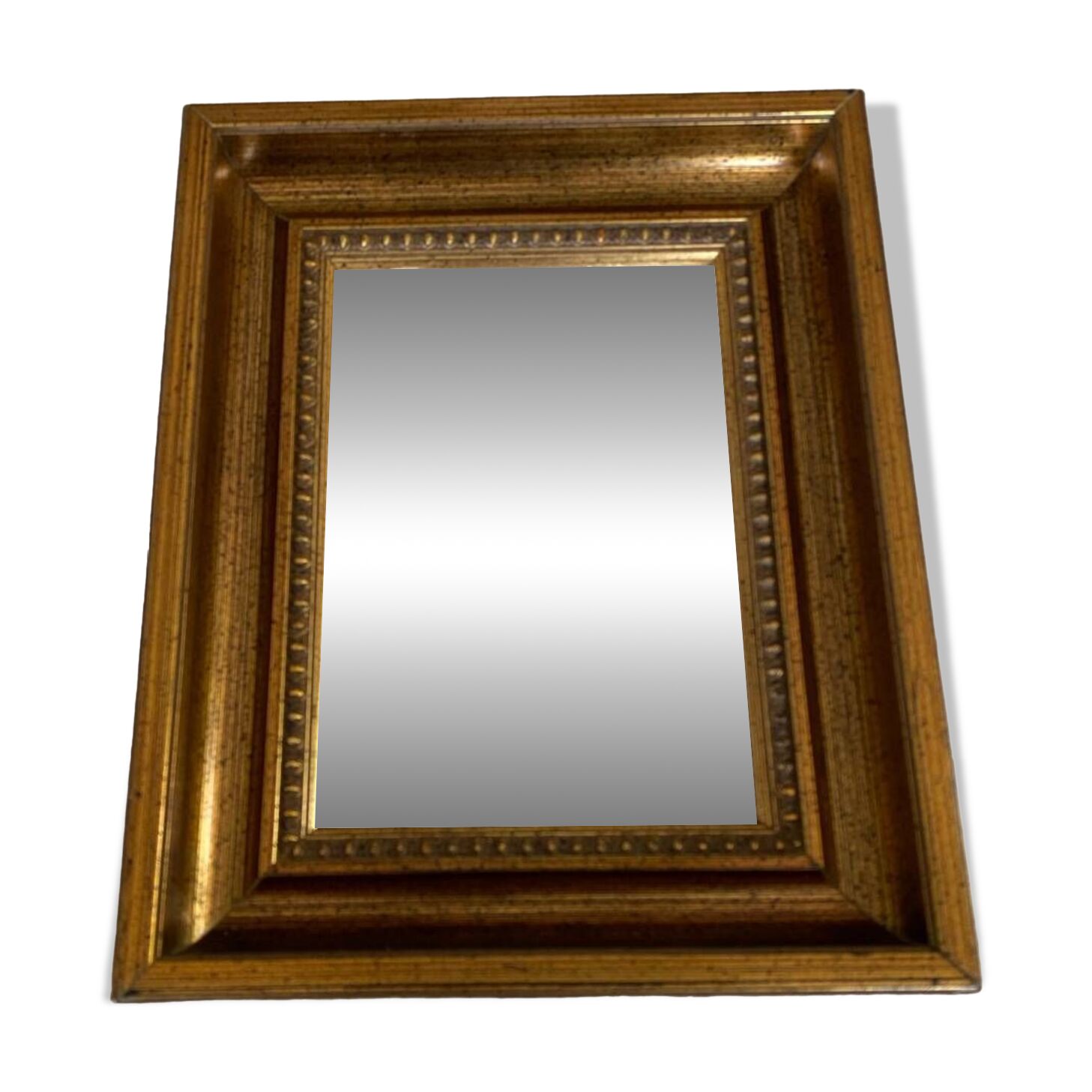 Bronze-colored framed mirror