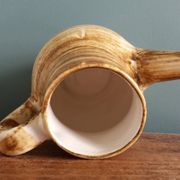 Sugar bowl and milk jug in Longchamp earthenware.