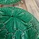 Set of 2 green earthenware dessert plates with vine decoration.