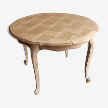 Table ronde en bois brut style Louis XV avec rallonge