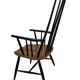 Vintage easy chair with high back and armrest from the 60s