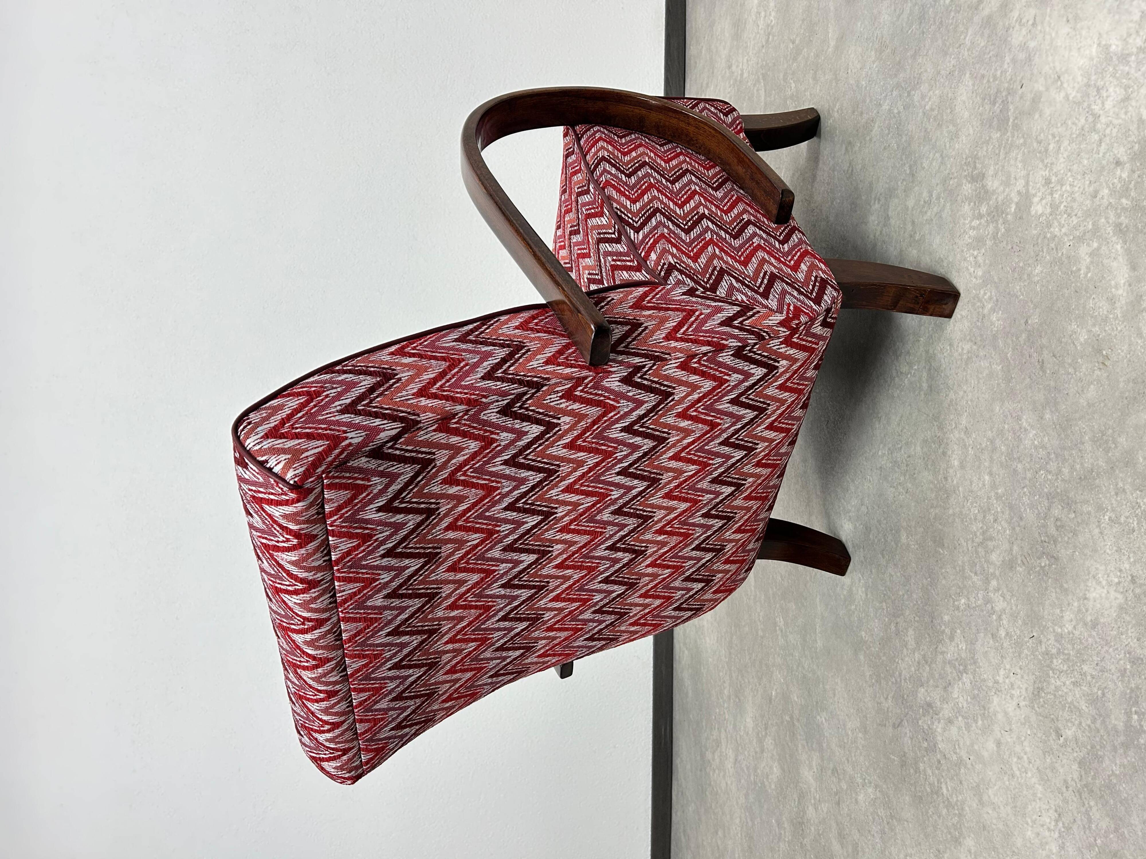 C-shaped lounge chair by J. Halabala
