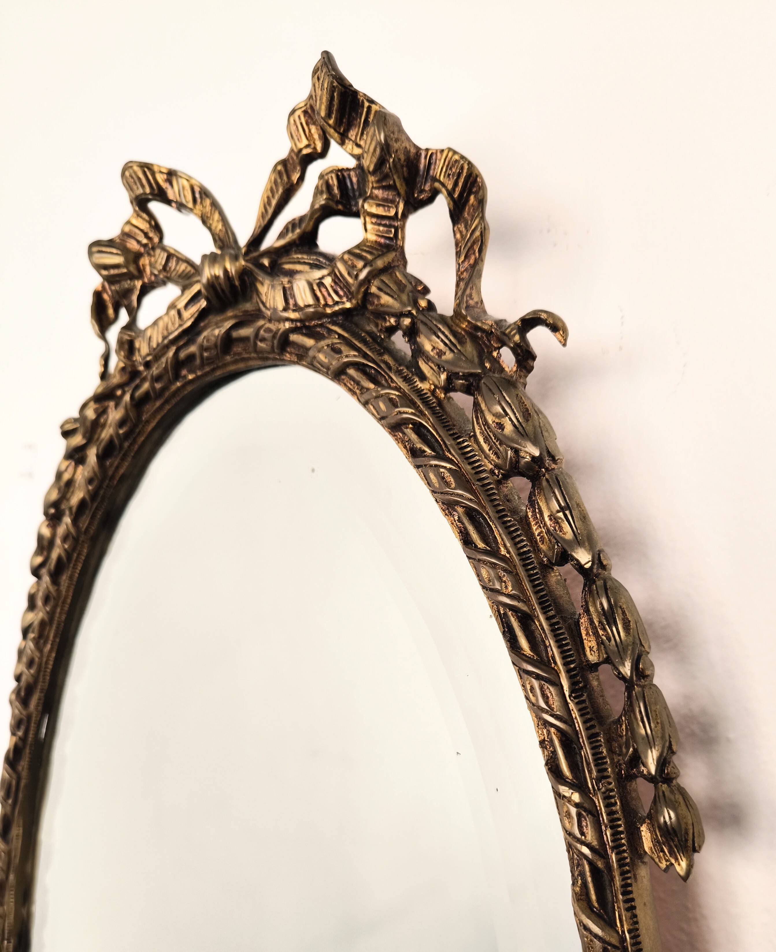 Bronze mirror in Hollywood Regency style from the 1940s/50s.