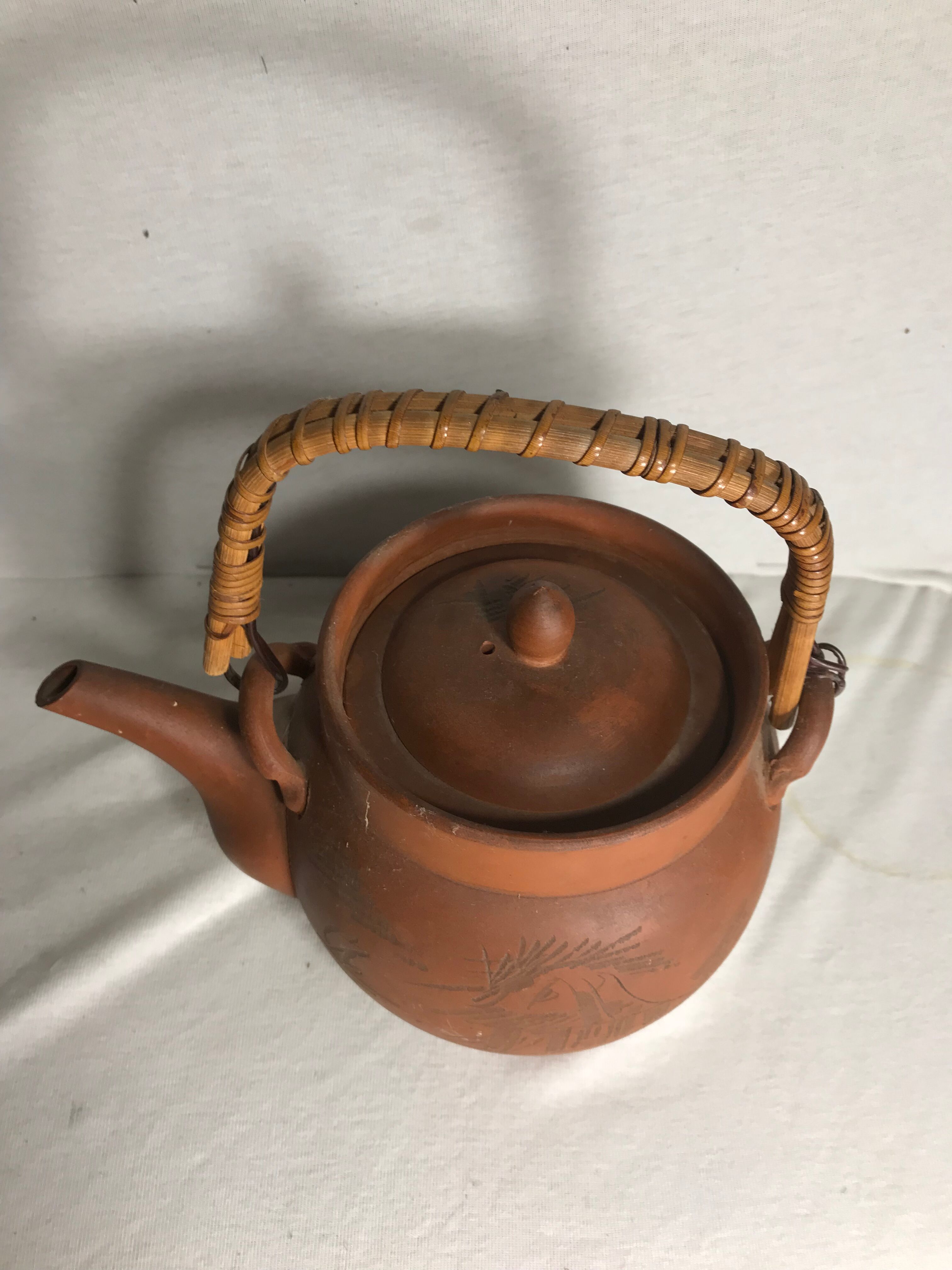 Antique terracotta teapot