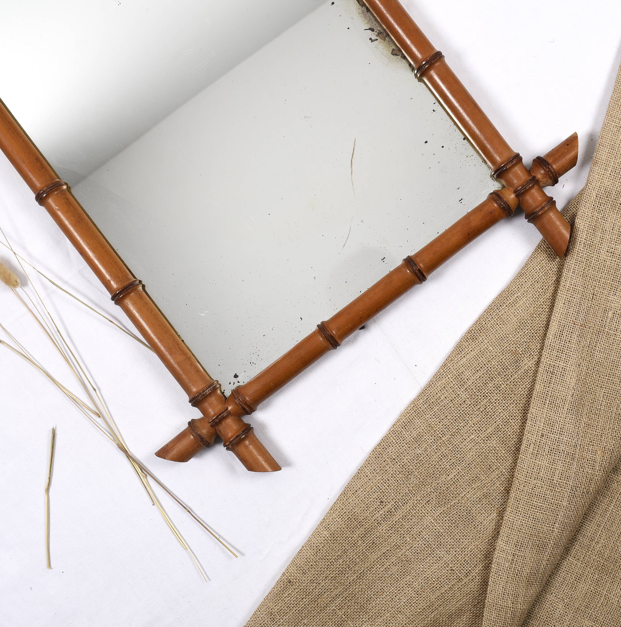 Old turned wooden mirror imitation bamboo
