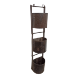 Suspension of three zinc buckets