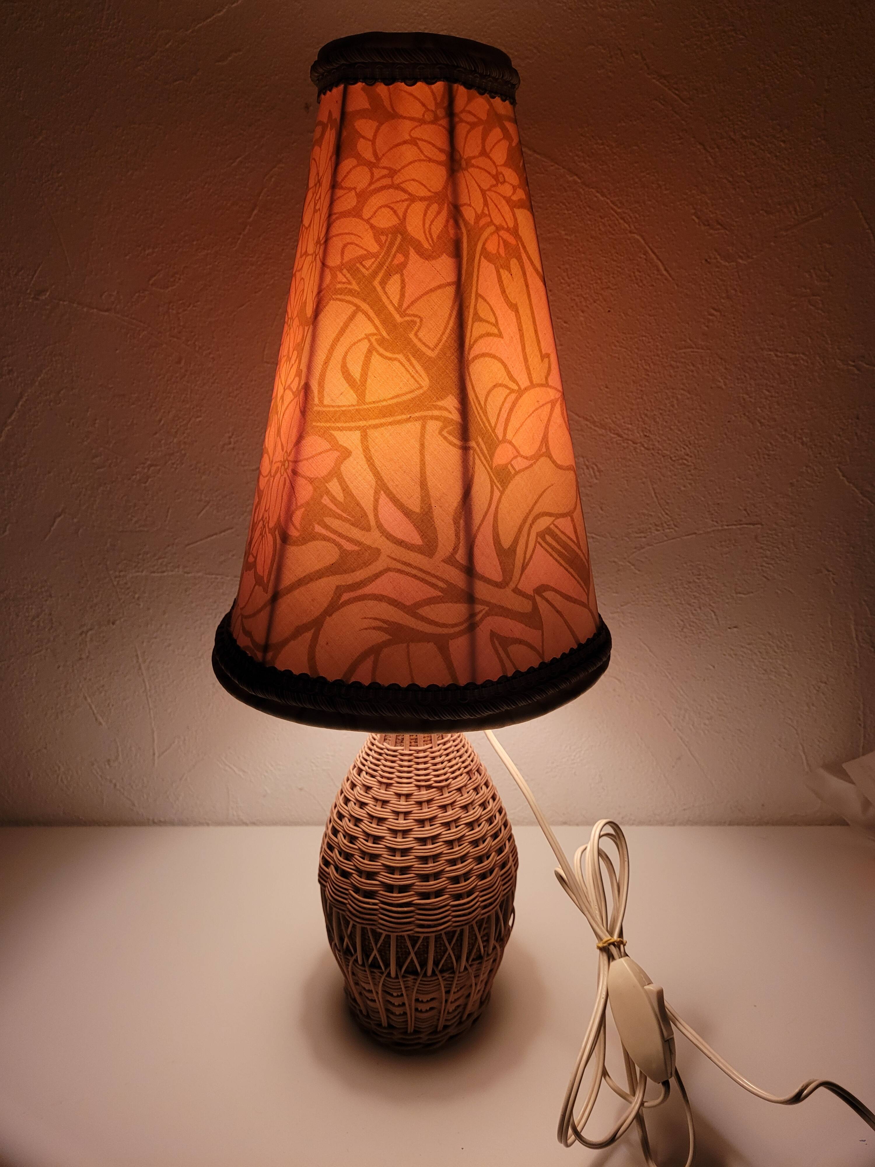 Vintage rattan lamp with yellow shade