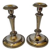 Pair of silver-plated zinc metal candlesticks
