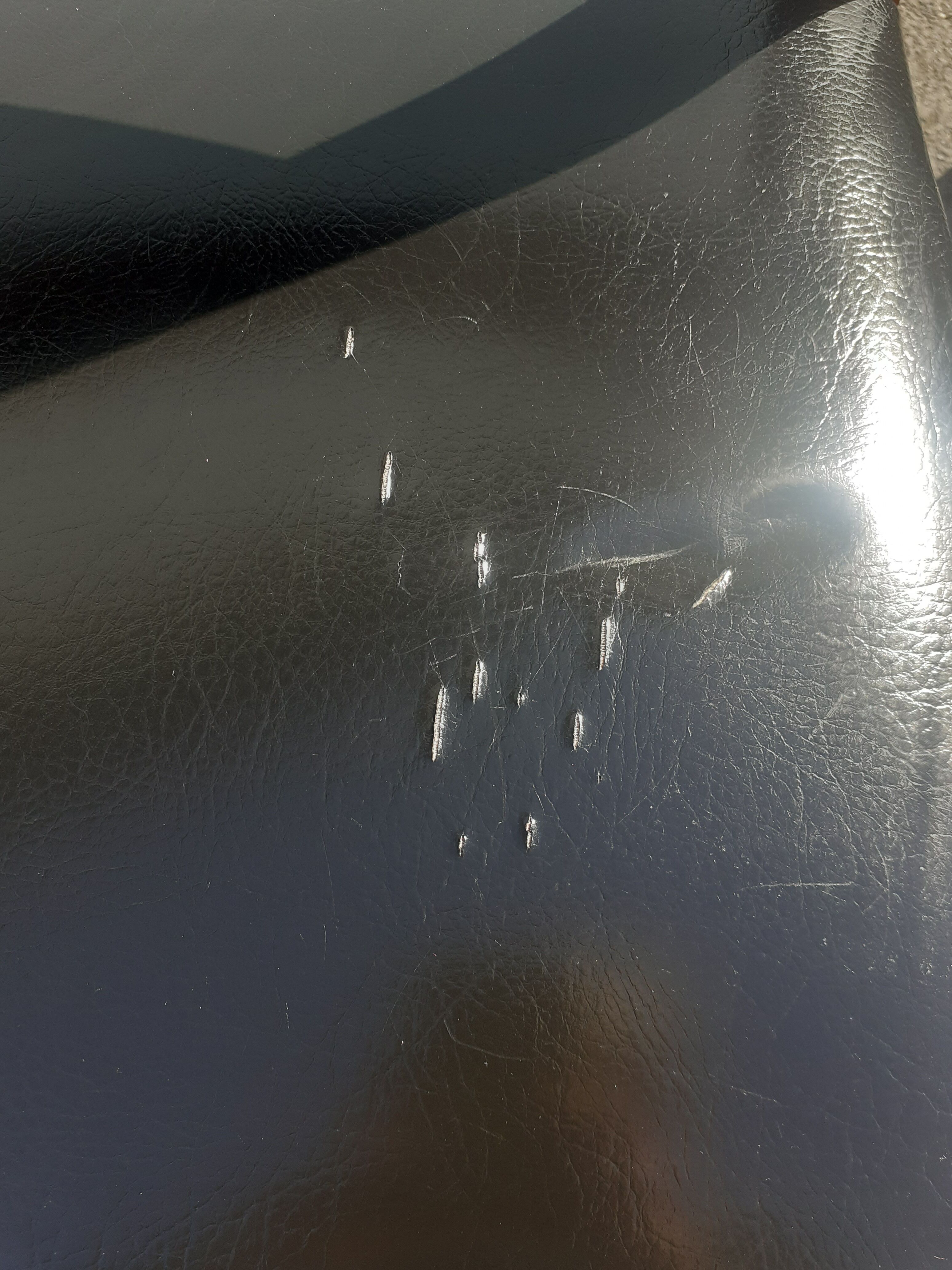 Scandinavian chairs in teak and black skaï.