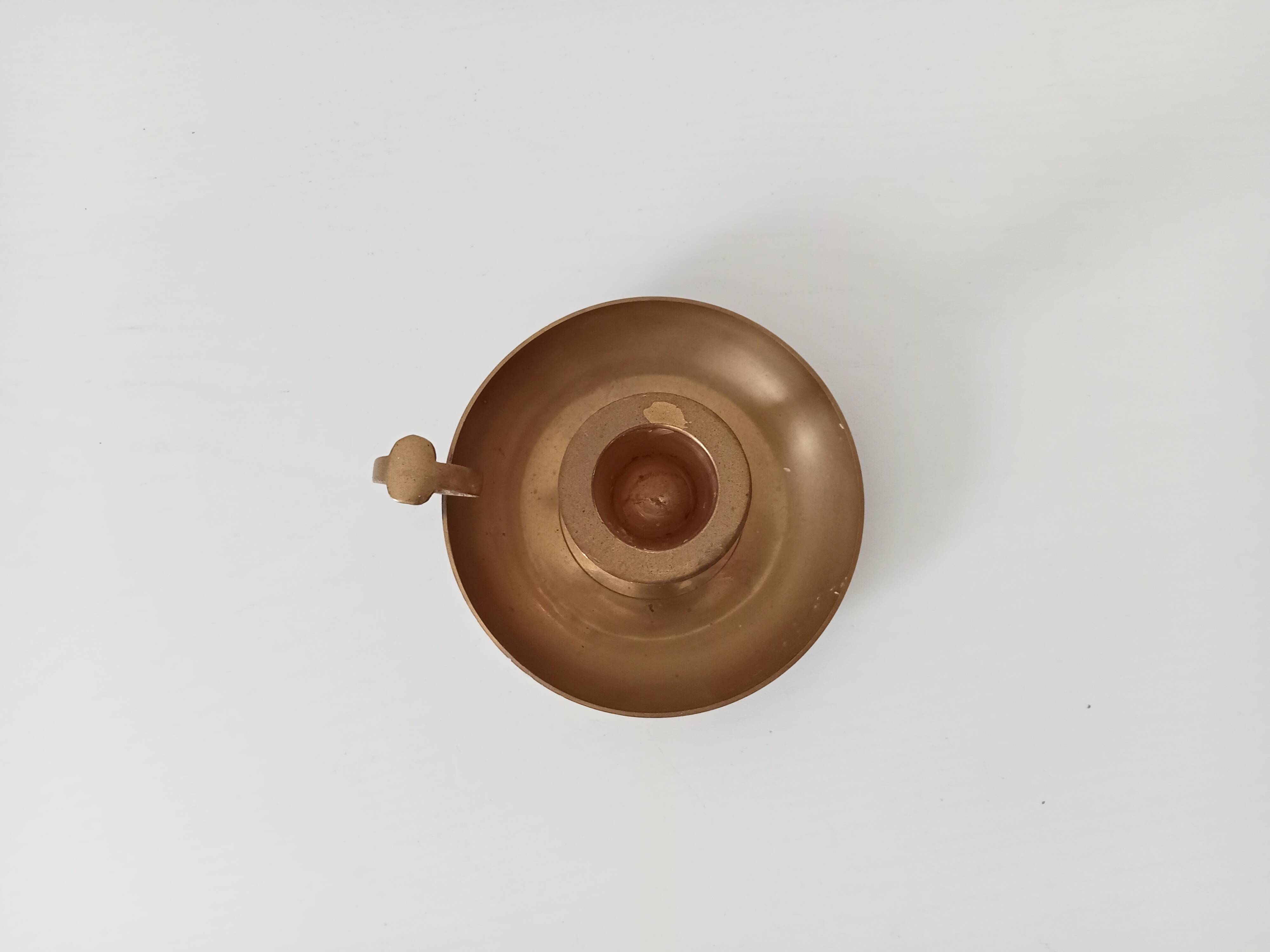 Vintage golden brass hand candle holder