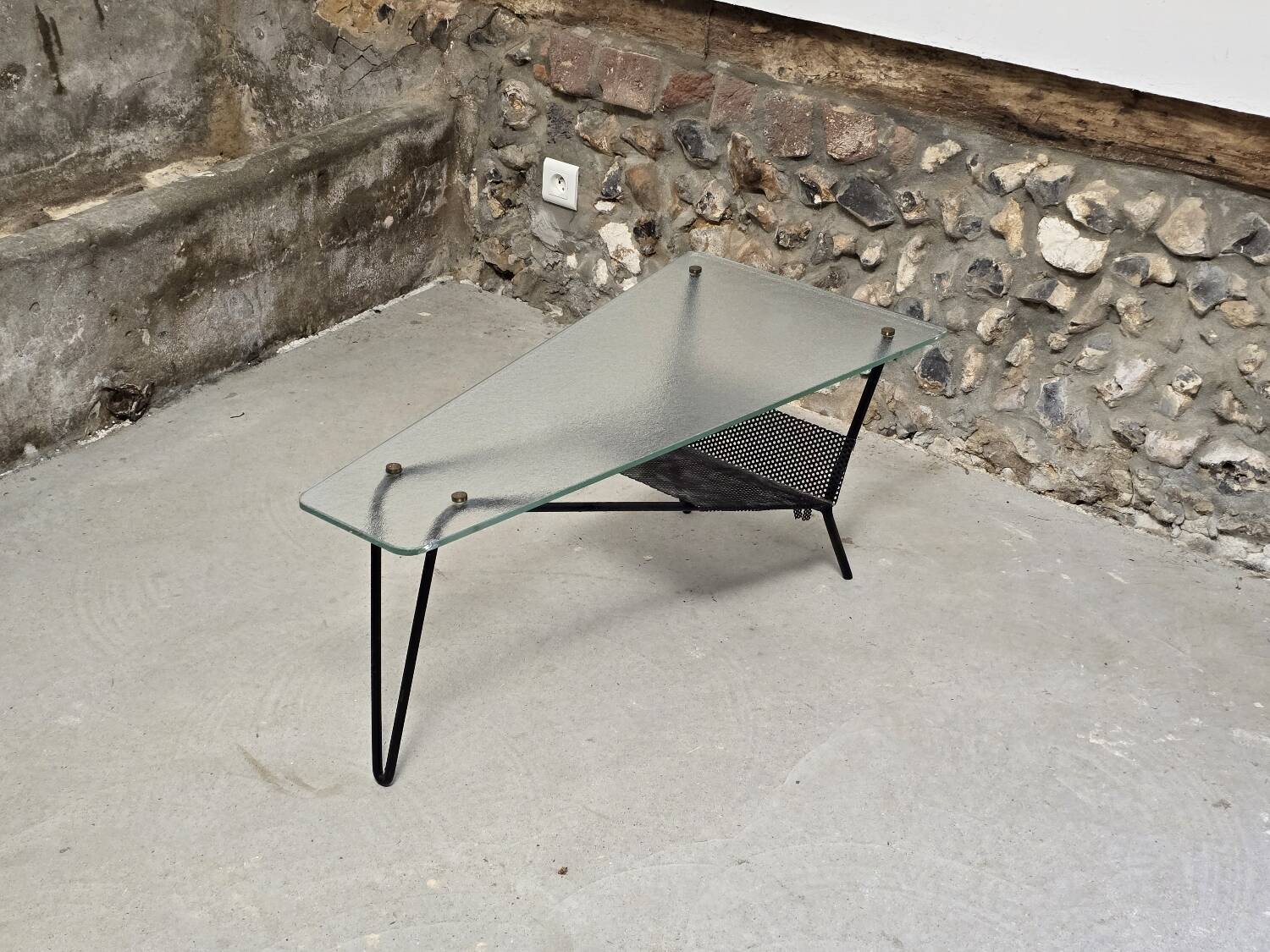 Coffee table in glass and black lacquered metal