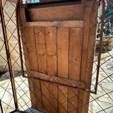 Imposing fireplace mirror in carved and painted wood, 19th century.