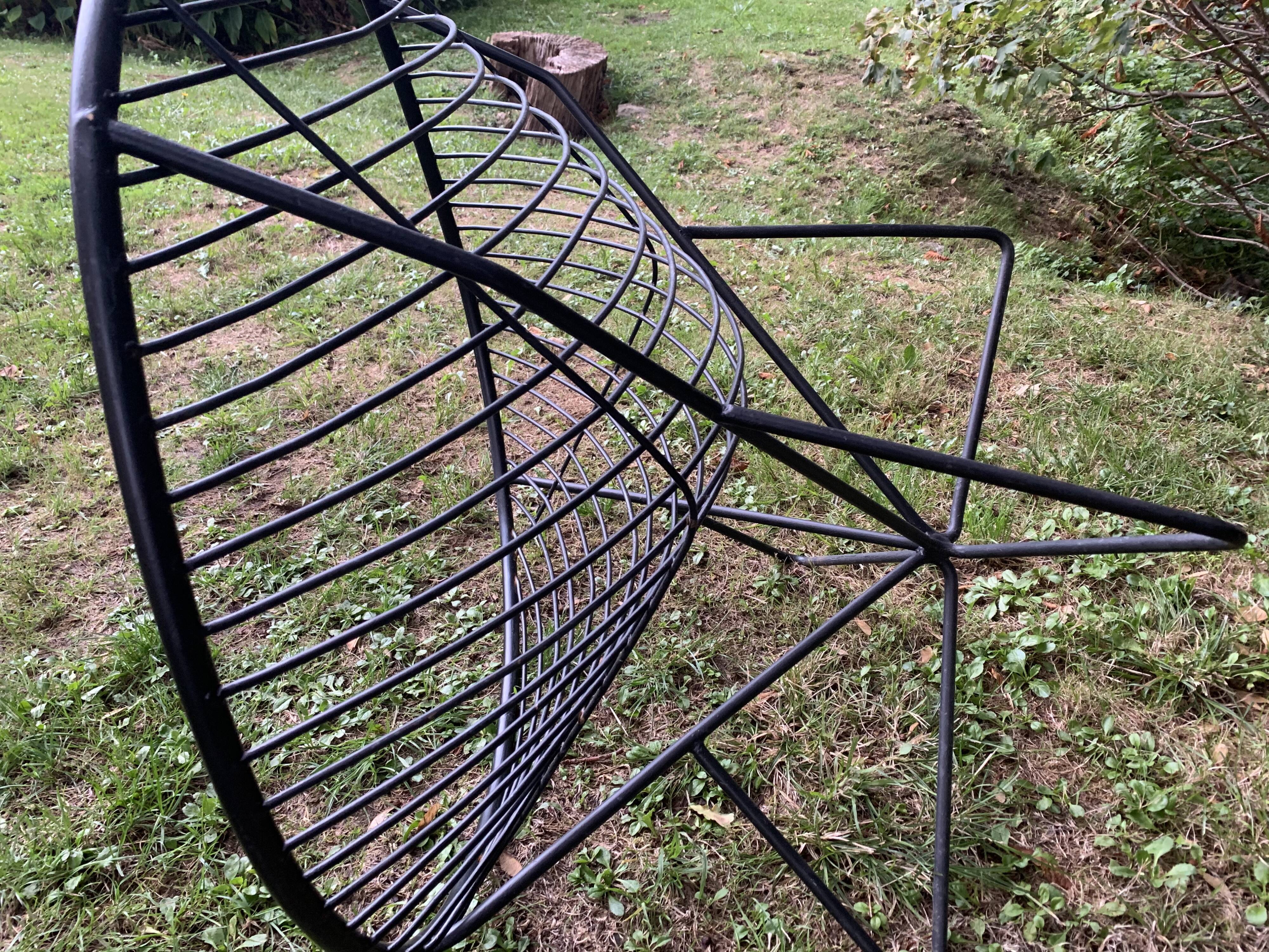Pair of round chairs in black tubular steel 1960