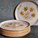 Six assiettes en grès de Niderviller au décor végétal vintages
