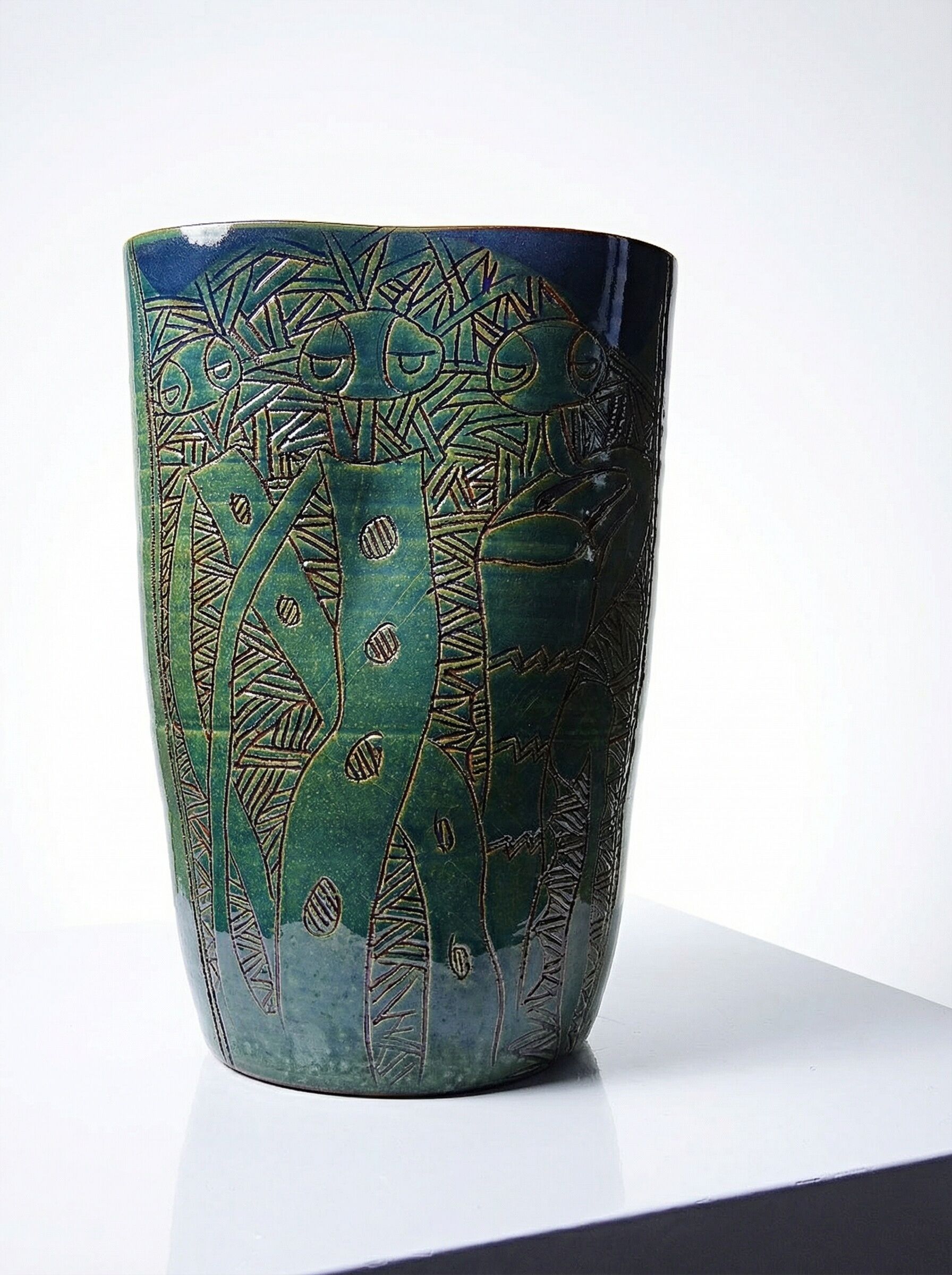 Vintage blue-green artisan pottery vase with incised tribal decoration Eseka Pottery.