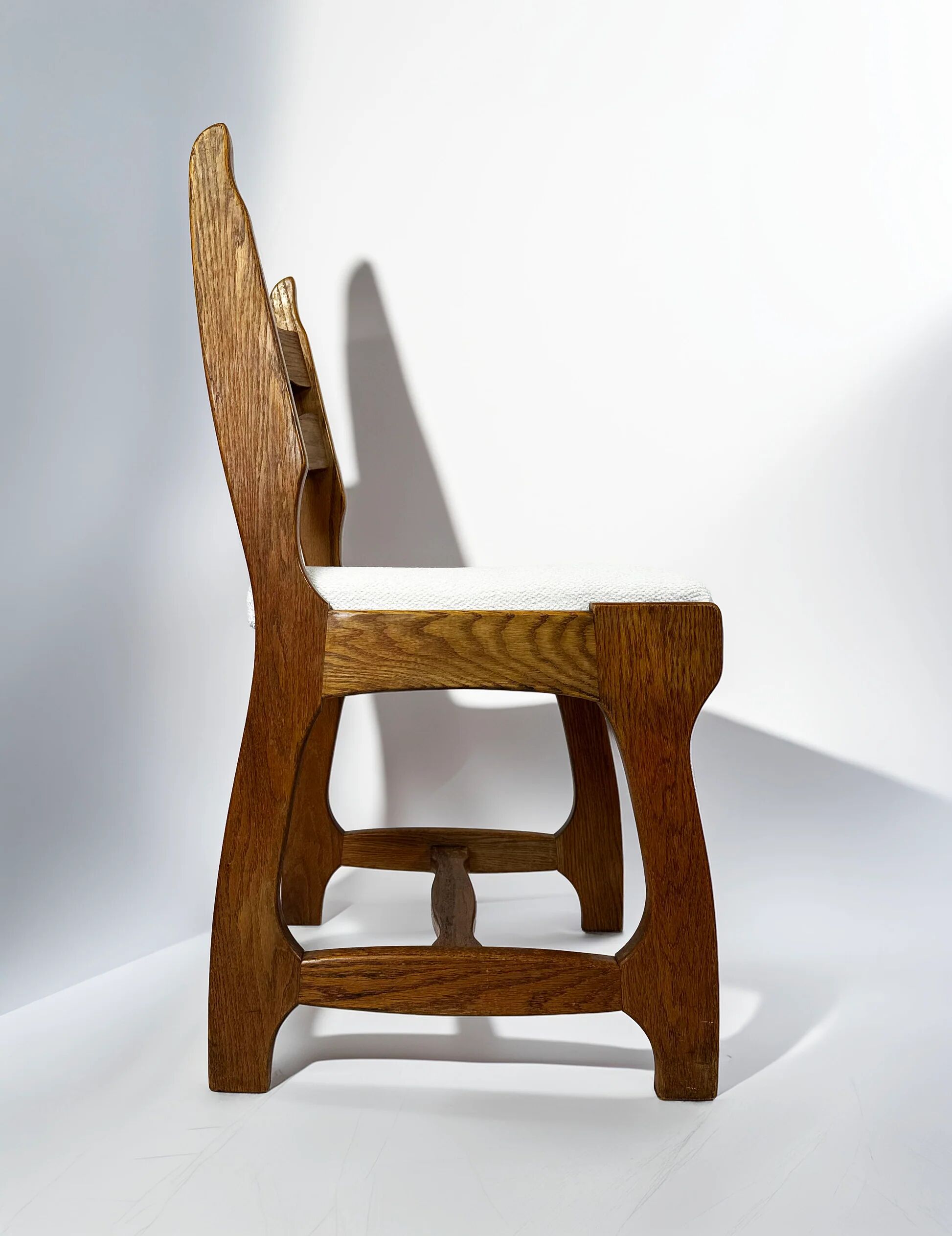 Set of 6 Belgian brutalist oak dining chairs, 1970s.