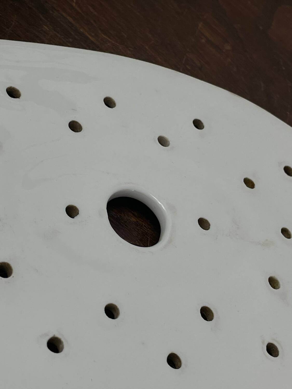 Old iron clay draining plate