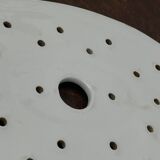 Old iron clay draining plate