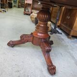 Round pedestal table with marble top and mahogany tripod from the 19th century