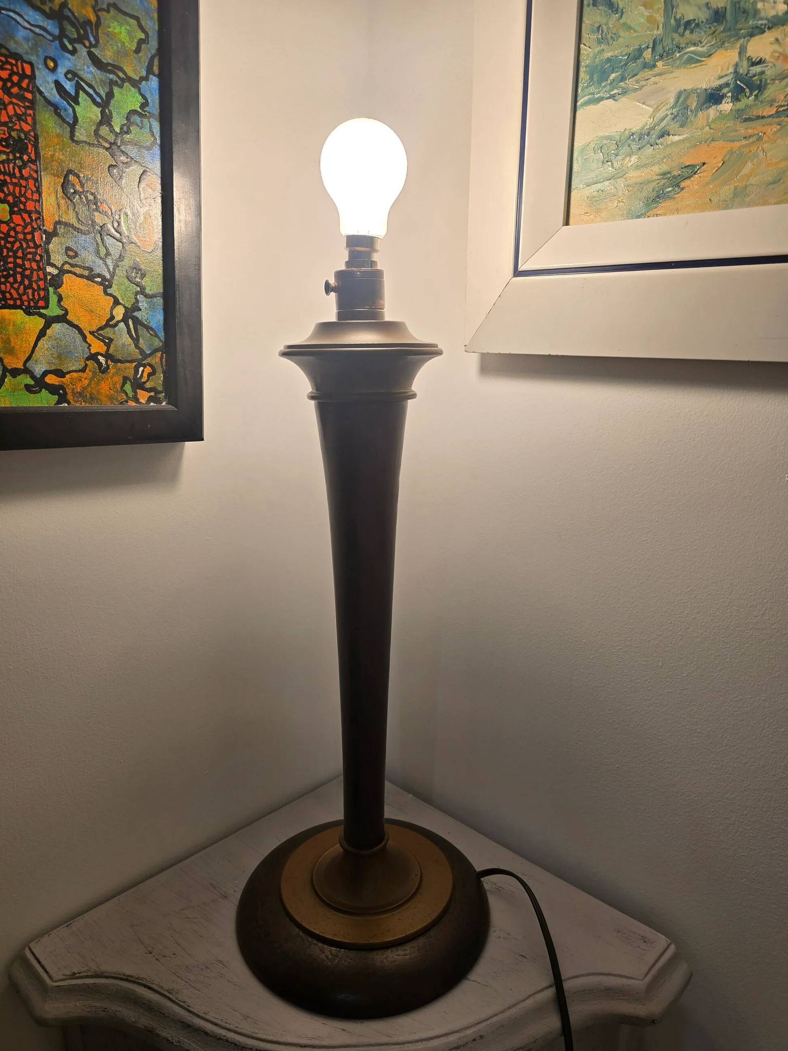 Vintage lamp base in Scandinavian style made of dark wood and bronze metal.