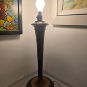 Vintage lamp base in Scandinavian style made of dark wood and bronze metal.