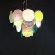 Handcrafted chandelier with Murano glass discs.