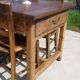 Old farmhouse table made entirely of restored solid oak.