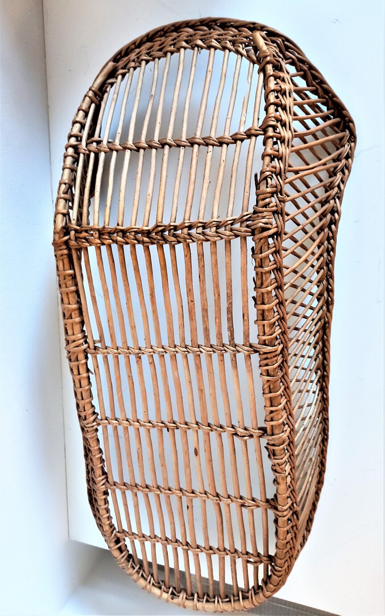 Rattan wicker woven bamboo bassinet or vintage bread pan