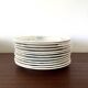 Set of 12 plates Terre de Fer, model Cartels, Creil & Montereau, 1900