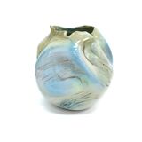 Postmodern sculptural hand-made iridescent blue glazed earthenware vase, italy