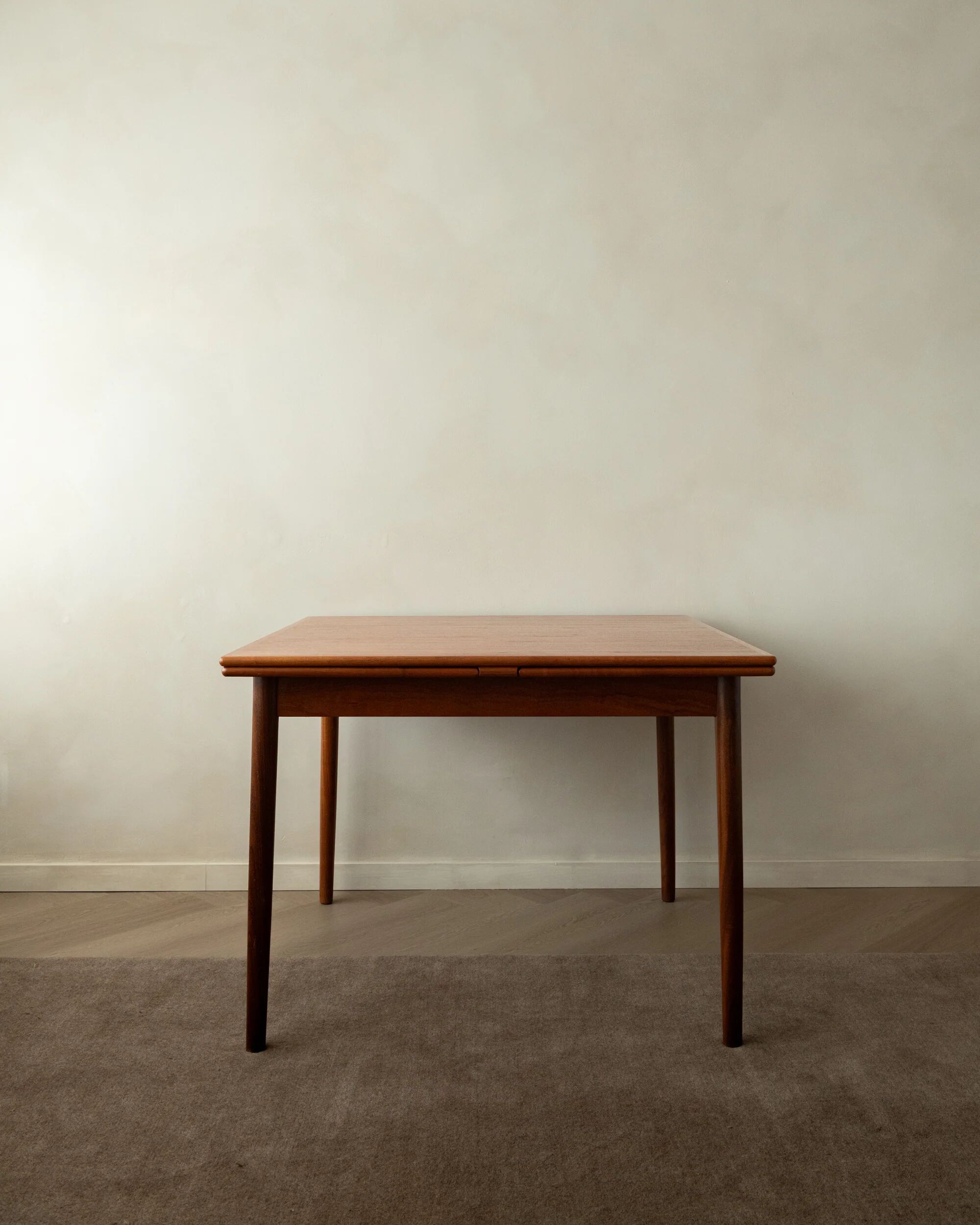 Danish modern teak extendable dining table model 24 by Ansager Møbler 1960s