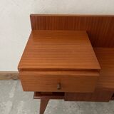 Varnished wooden bedside table