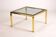 Brass and glass coffee table, 1970s, Europe