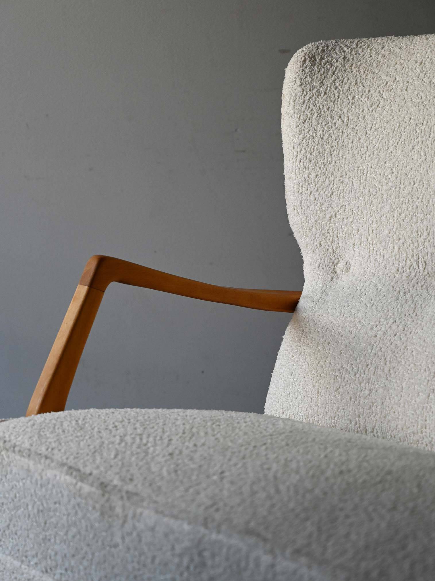 Vintage Scandinavian sofa with faux lambskin